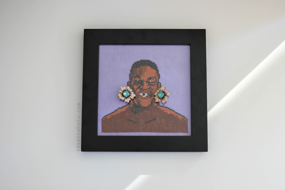 Mike Tyson cross stitch art, by Calgary artist; Floral Swarovski crystal earrings, Aldo accessories.